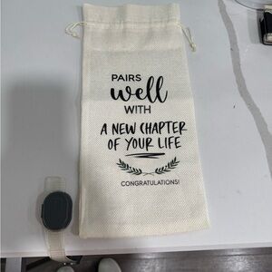Chic Cream Drawstring Wine Bag with Black Lettering